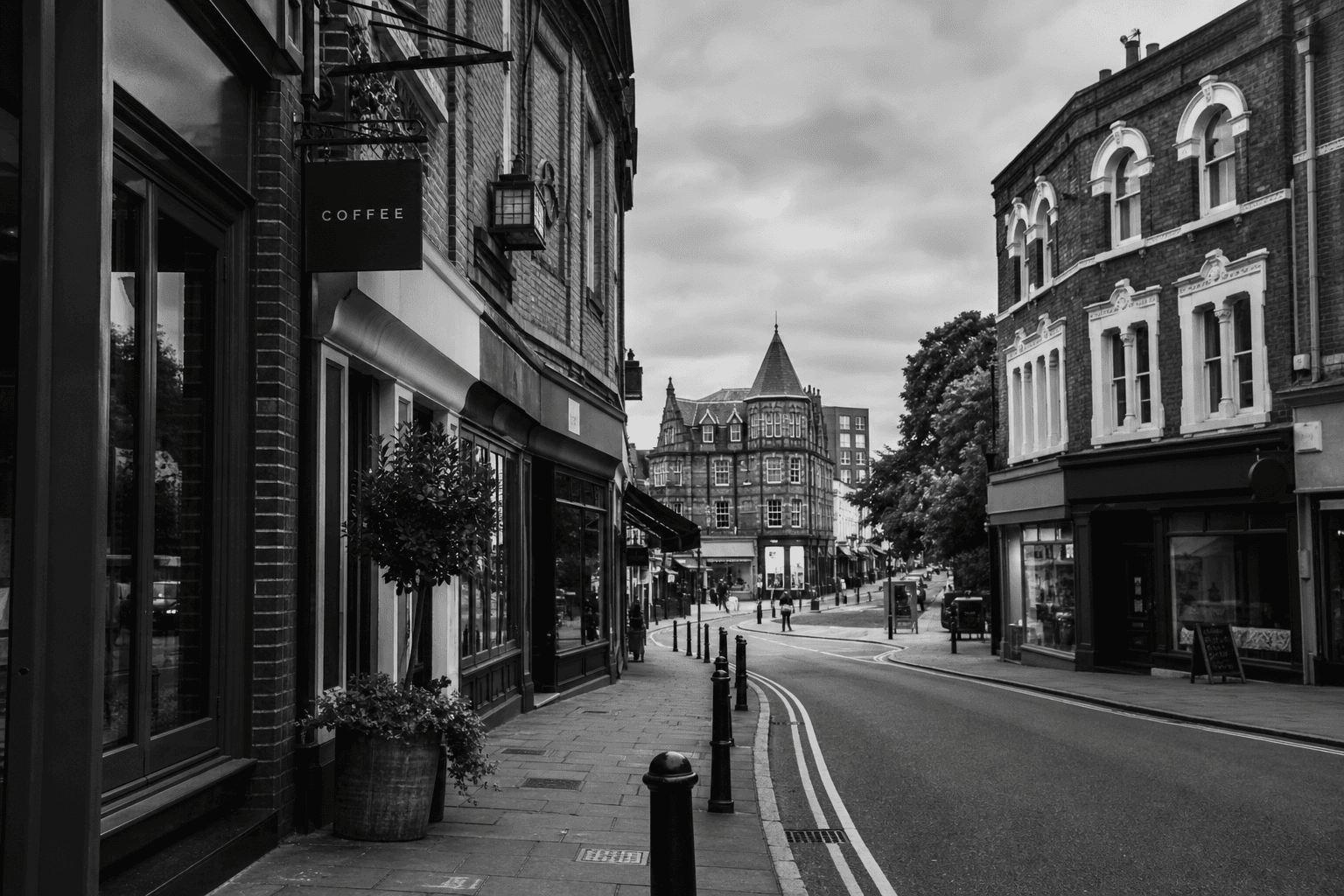 Nottingham street with brick buildings and shop fronts